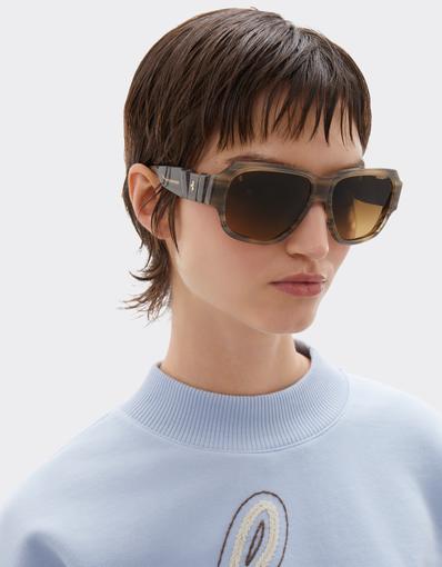 Limited-edition sunglasses in green-striped acetate, ‘  ’ by Takiron, with green gradient lenses and an 18-carat gold Prancing Horse