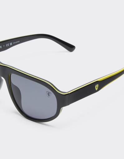 Scuderia Ferrari 0FZ6027 sunglasses in black and yellow acetate with dark grey lenses.