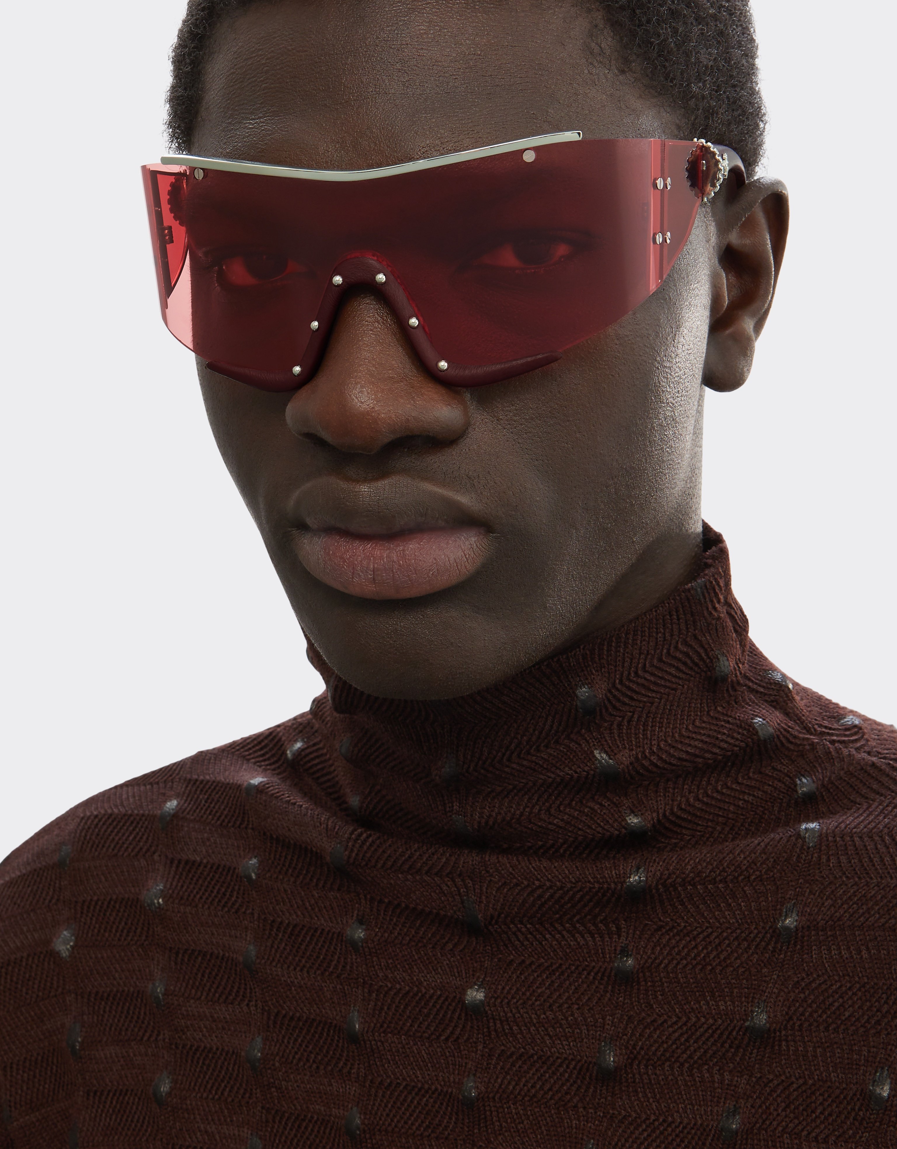 Ferrari sunglasses in metal and red leather with a red frame