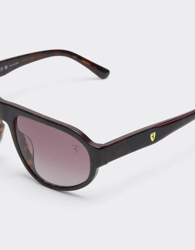 Scuderia Ferrari 0FZ6027 sunglasses in havana and burgundy acetate with gradient red lenses.