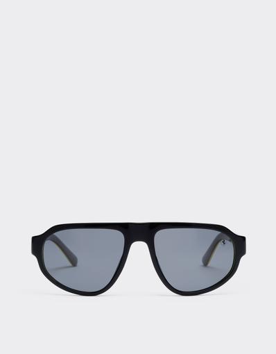 Scuderia Ferrari 0FZ6027 sunglasses in black and yellow acetate with dark grey lenses.