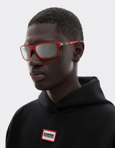 Scuderia Ferrari 0FZ6021 sunglasses in matte Ferrari red injected and metal with mirrored grey lenses.