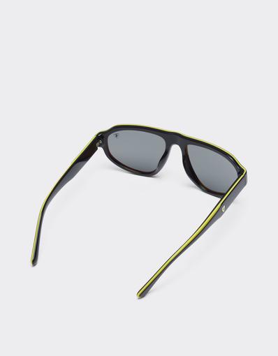 Scuderia Ferrari 0FZ6027 sunglasses in black and yellow acetate with dark grey lenses.
