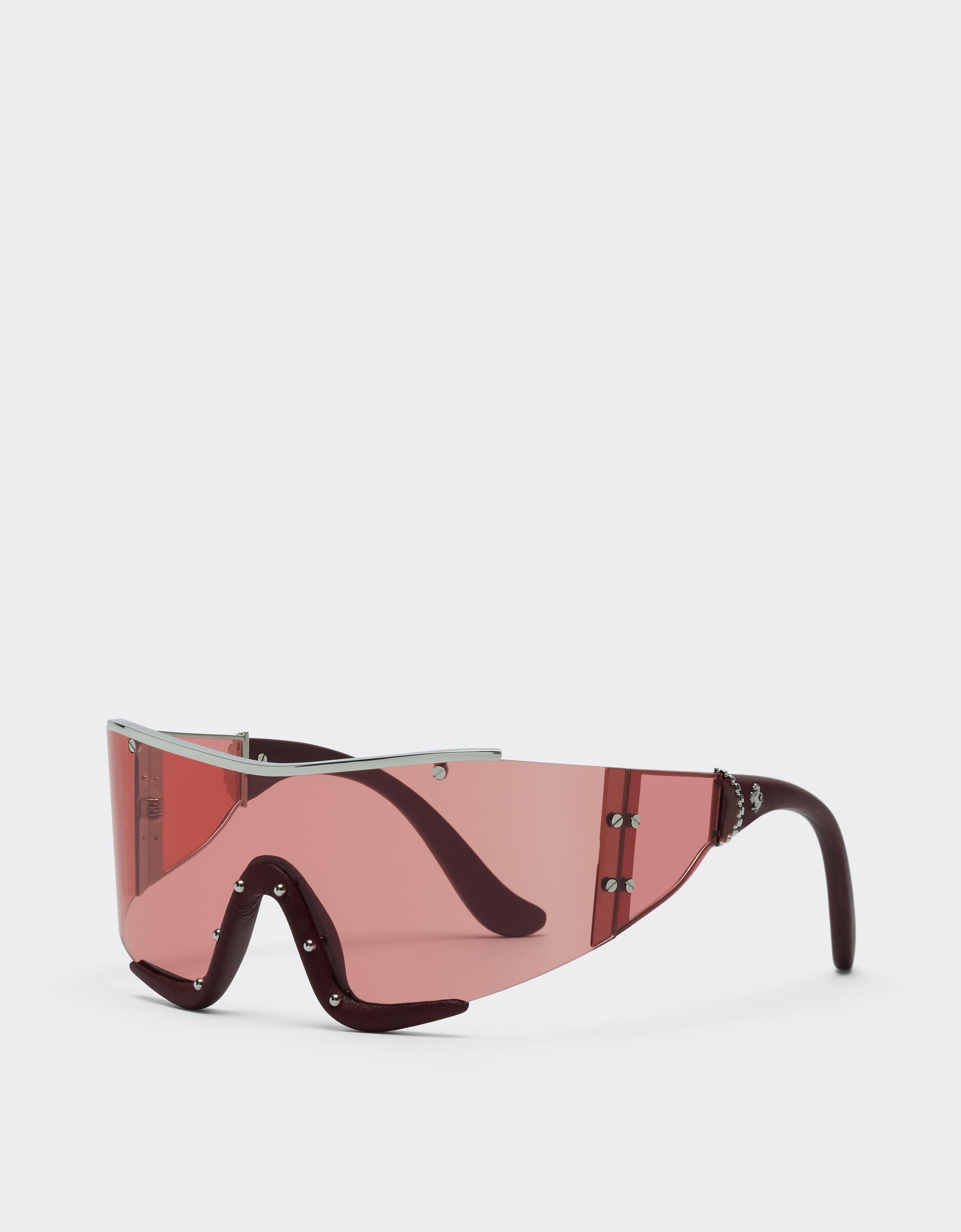 Ferrari sunglasses in metal and red leather with a red frame
