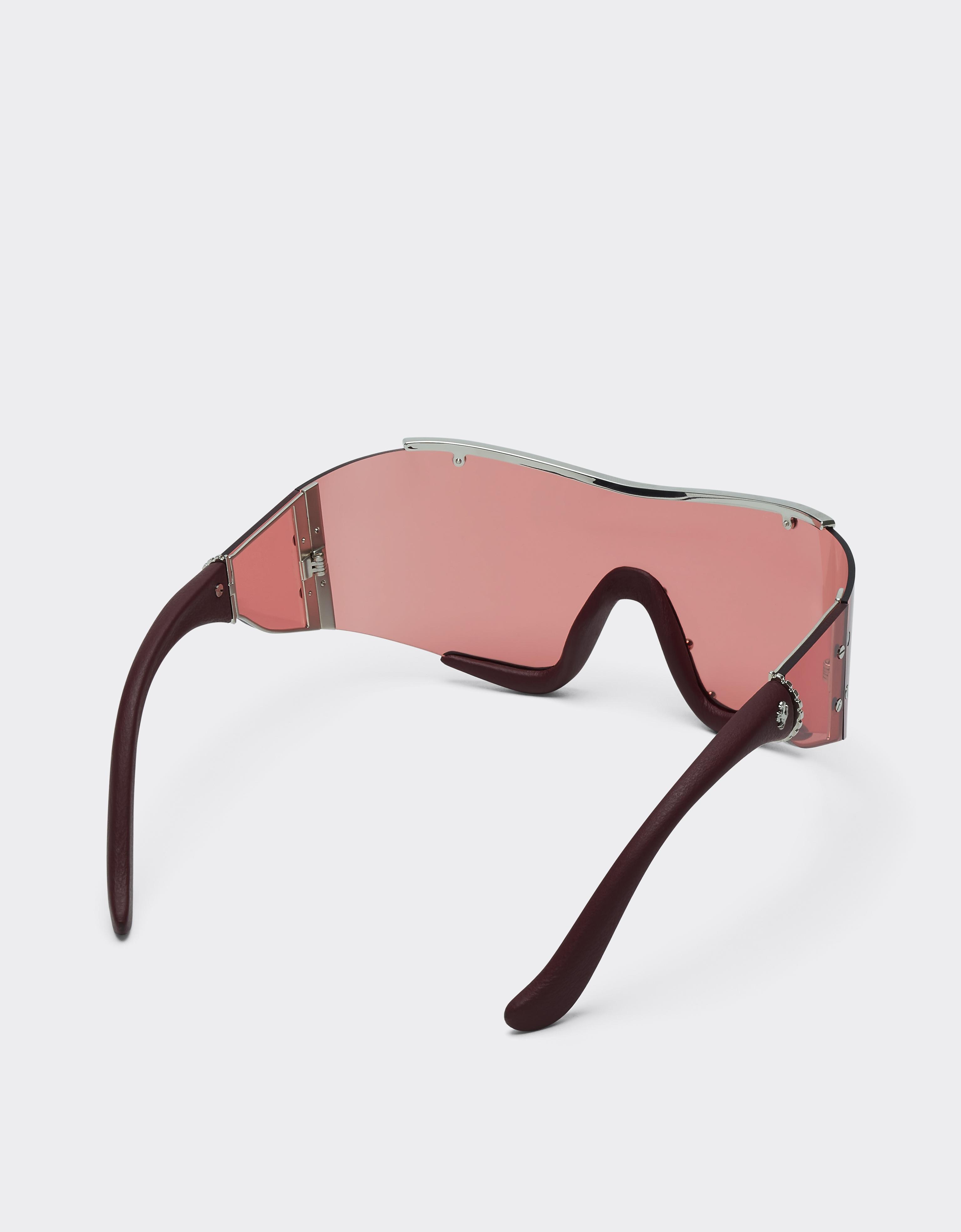 Ferrari sunglasses in metal and red leather with a red frame