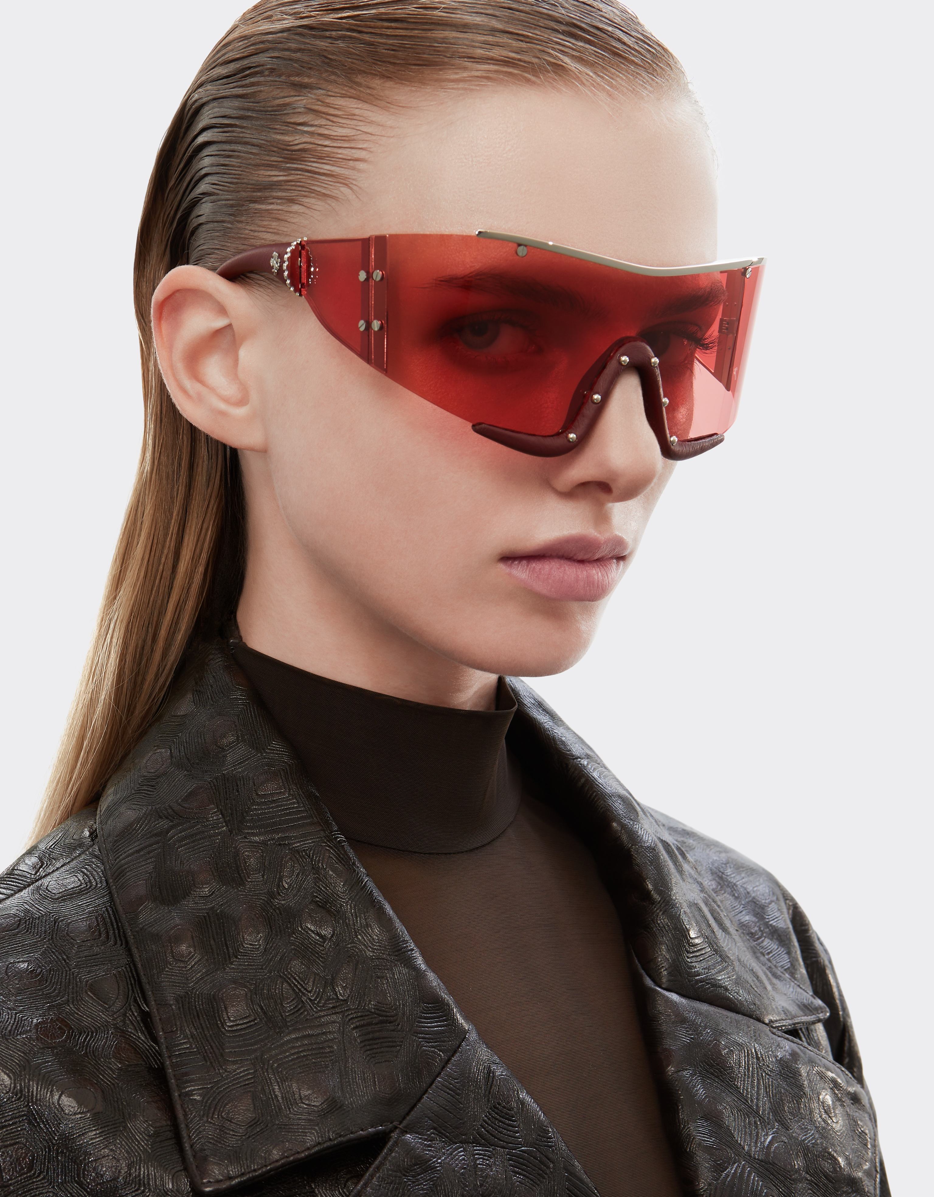 Ferrari sunglasses in metal and red leather with a red frame
