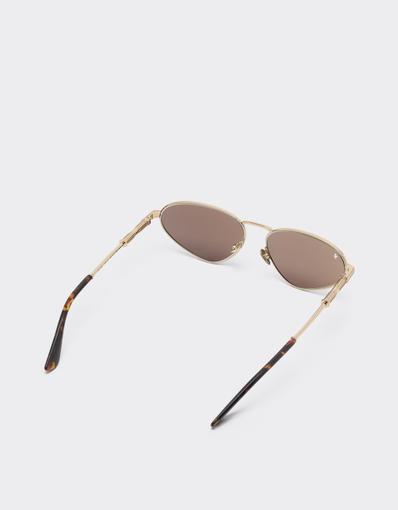 Lunettes de soleil en métal doré avec verres blancs à effet miroir doré