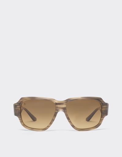 Limited-edition sunglasses in green-striped acetate, ‘  ’ by Takiron, with green gradient lenses and an 18-carat gold Prancing Horse