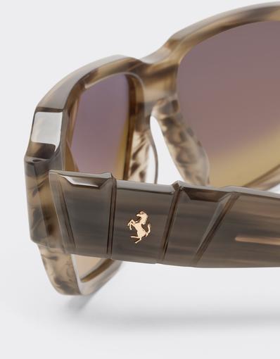 Limited-edition sunglasses in green-striped acetate, ‘  ’ by Takiron, with green gradient lenses and an 18-carat gold Prancing Horse