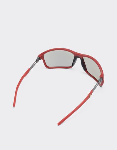 Scuderia Ferrari 0FZ6021 sunglasses in matte Ferrari red injected and metal with mirrored grey lenses.