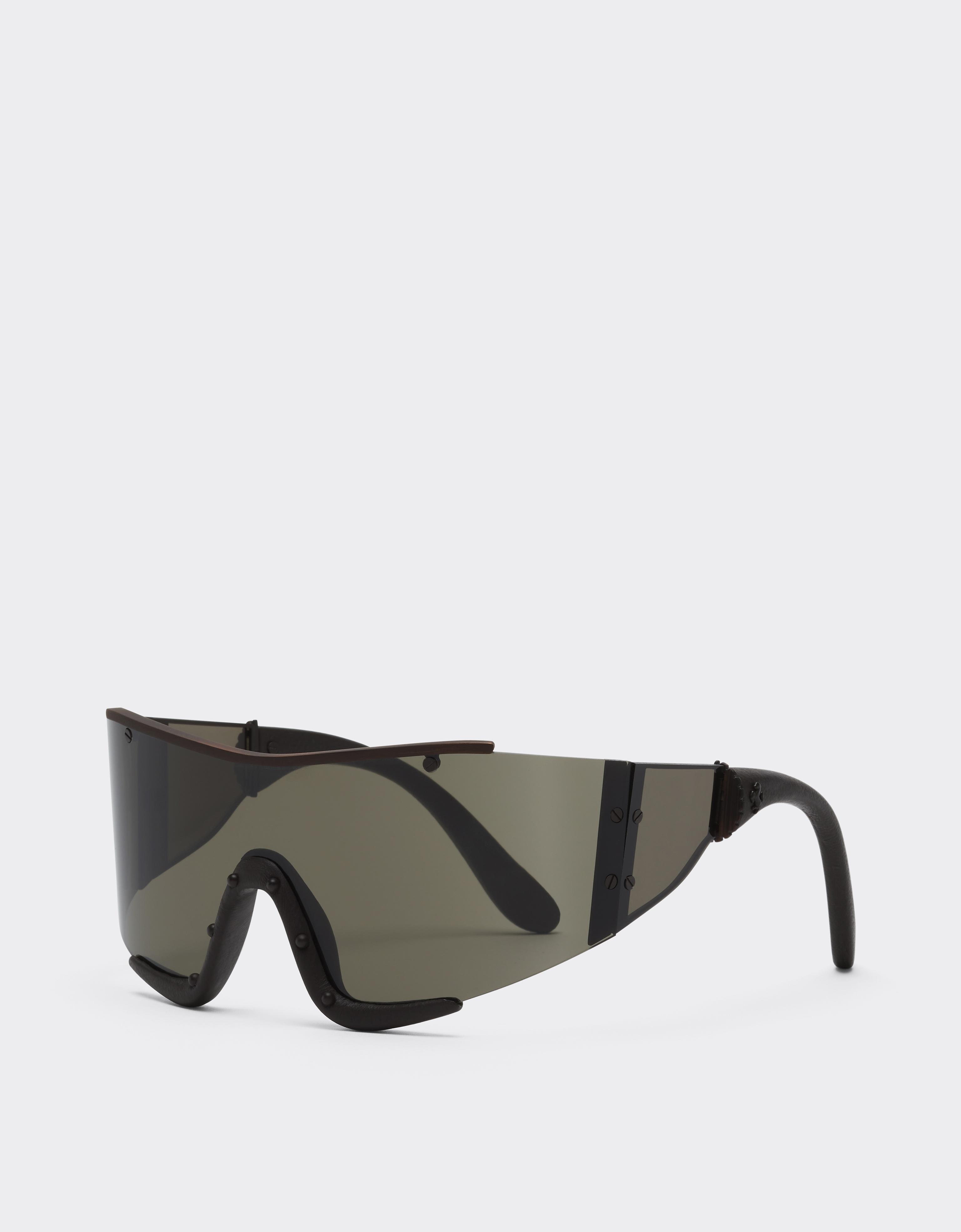 Ferrari sunglasses in metal and brown leather with a brown frame