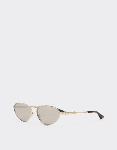 Lunettes de soleil en métal doré avec verres blancs à effet miroir doré
