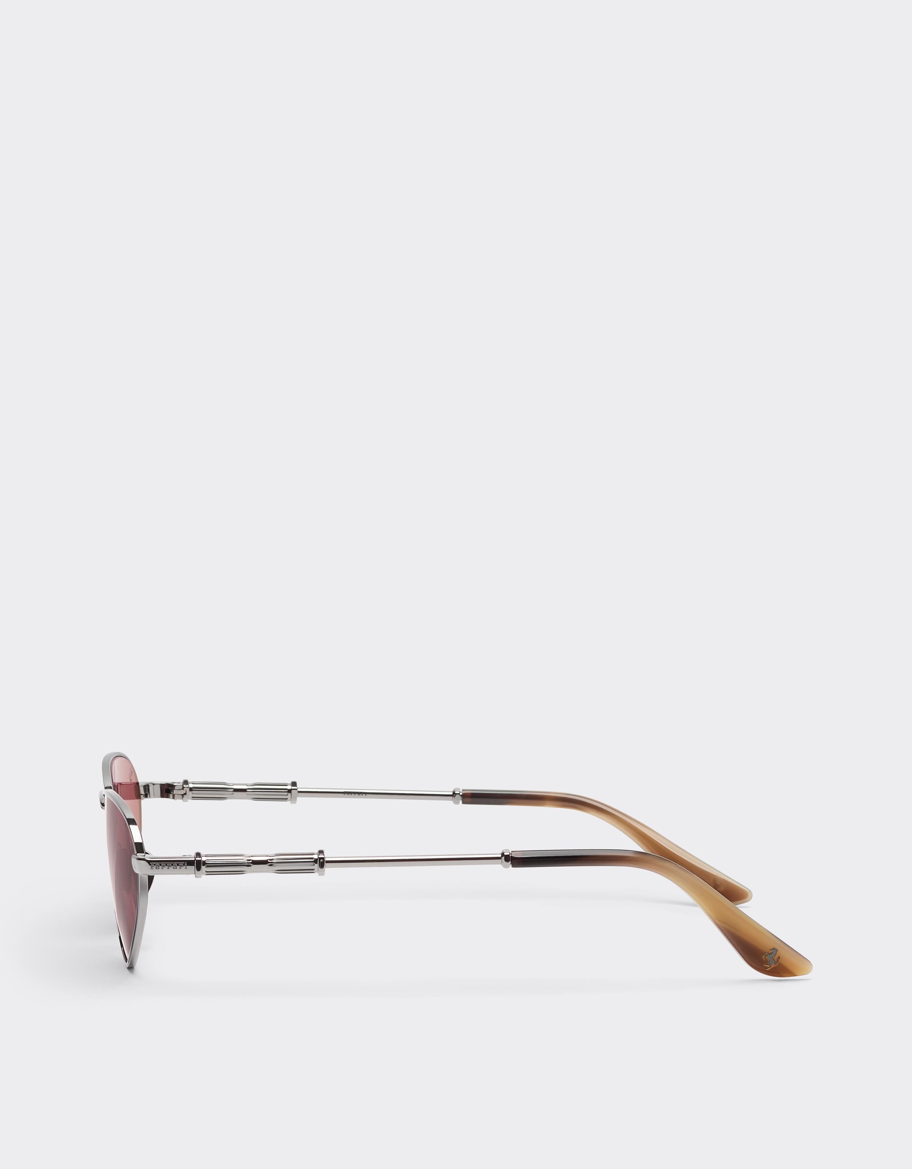 Sunglasses in polished gunmetal metal with exclusive Contrast Pro™ lenses