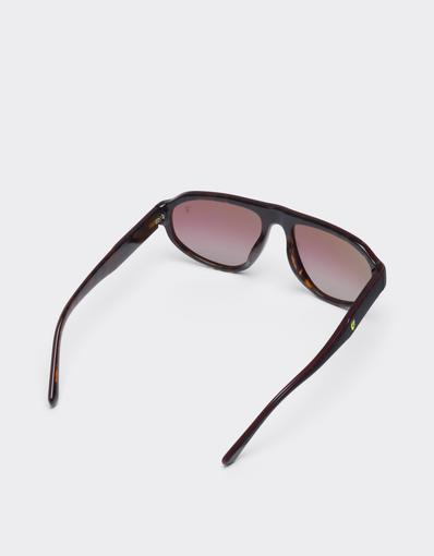 Scuderia Ferrari 0FZ6027 sunglasses in havana and burgundy acetate with gradient red lenses.