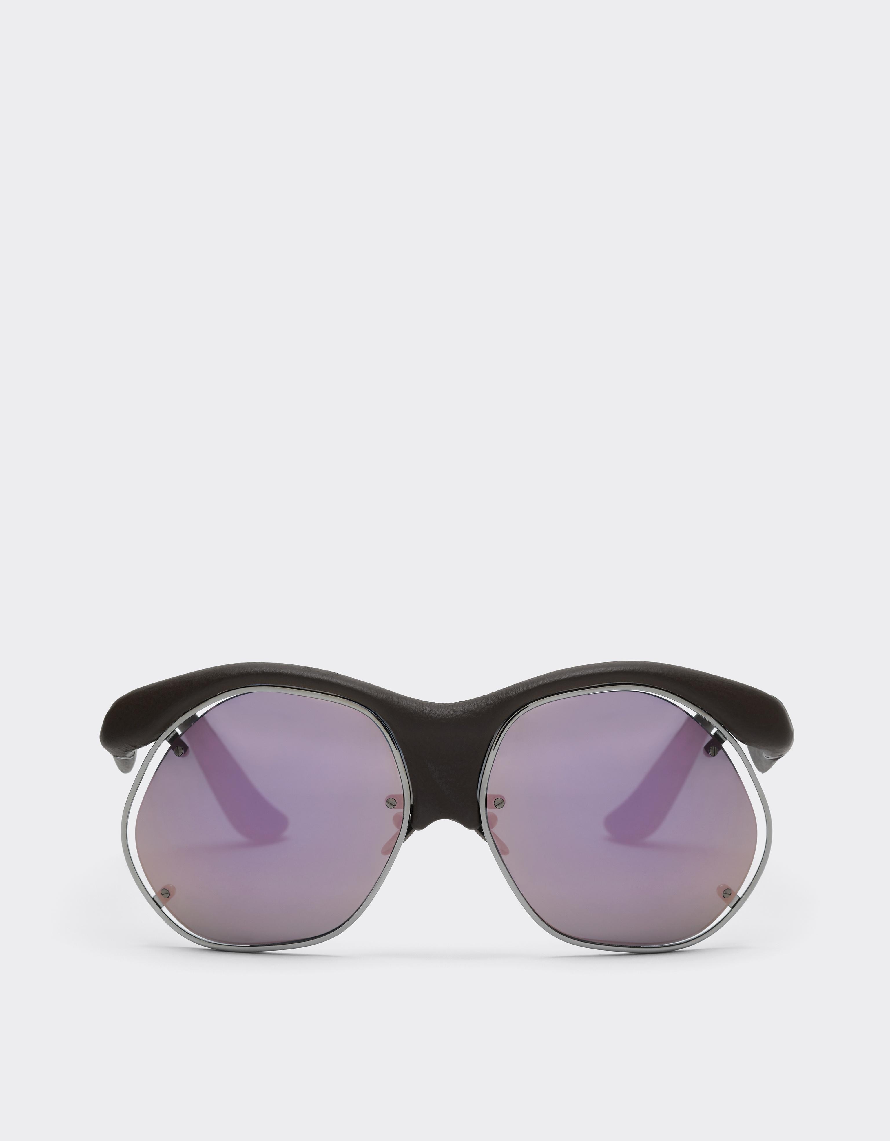 Injection-moulded sunglasses in metal and dark brown leather with grey lenses featuring a pink mirror finish