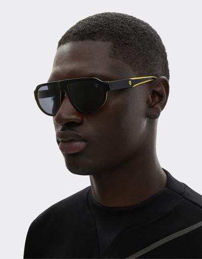 Scuderia Ferrari 0FZ6027 sunglasses in black and yellow acetate with dark grey lenses.
