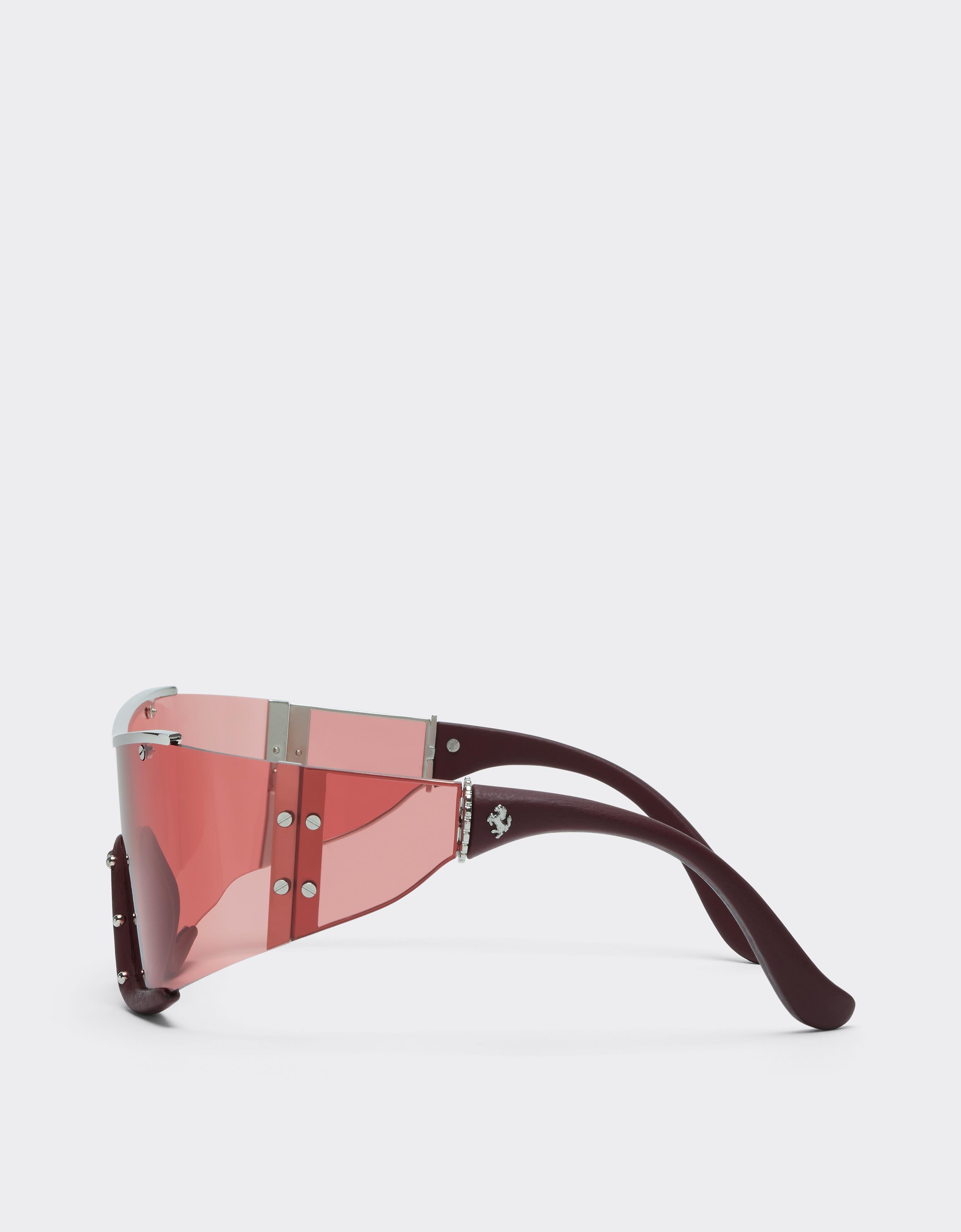 Ferrari sunglasses in metal and red leather with a red frame