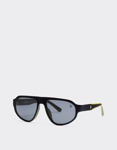Scuderia Ferrari 0FZ6027 sunglasses in black and yellow acetate with dark grey lenses.