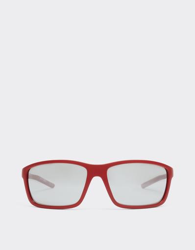 Scuderia Ferrari 0FZ6021 sunglasses in matte Ferrari red injected and metal with mirrored grey lenses.