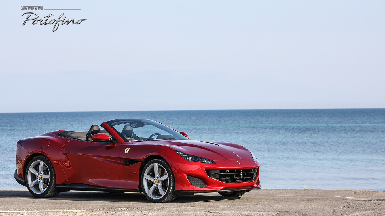 ferrari in front of water